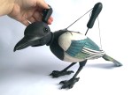 This Delightful Magpie Puppet is Carved from Wood